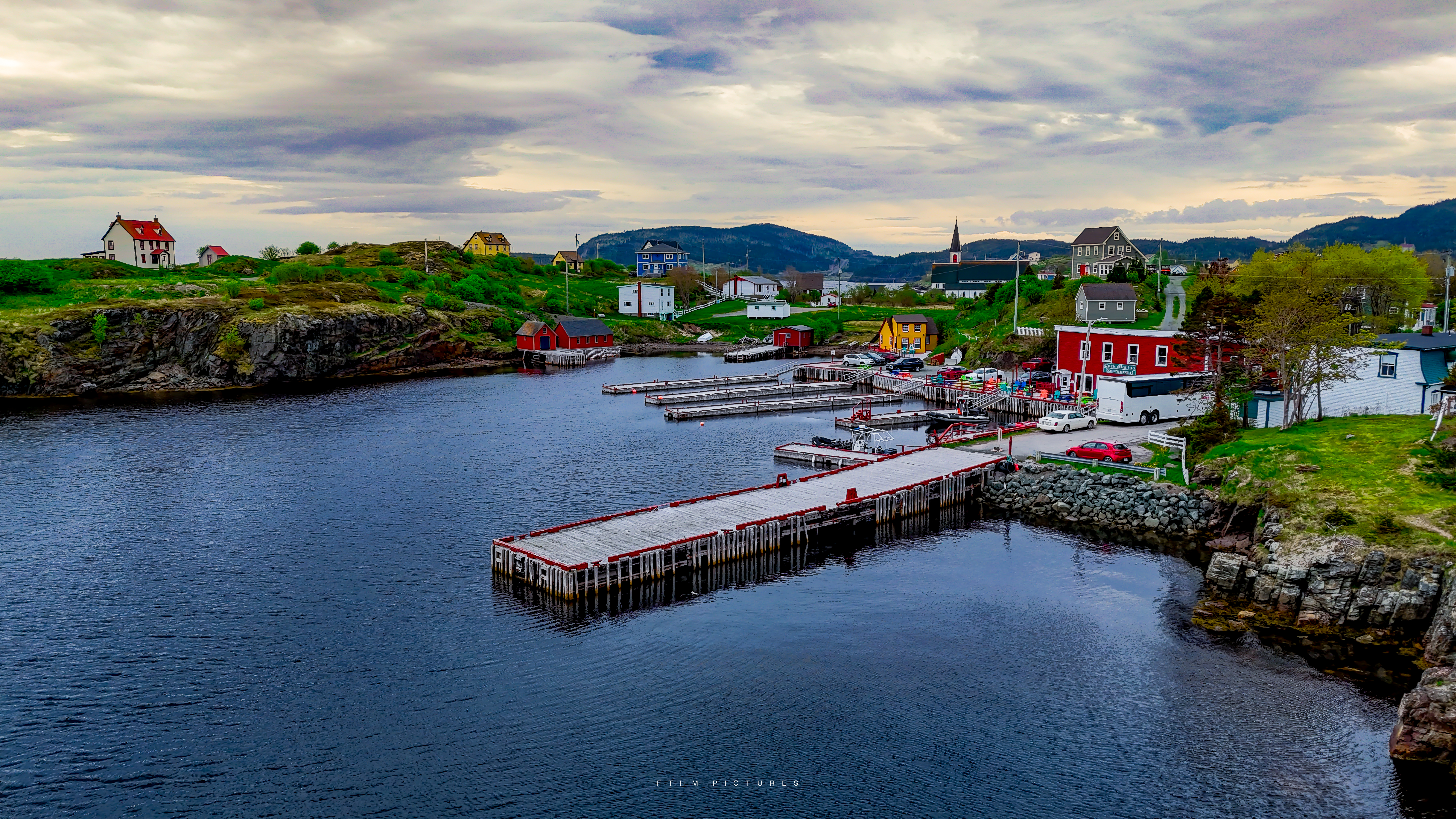 Aerial view of a colourful harbour town